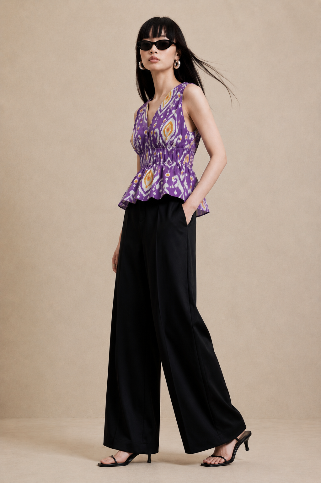 Women's Purple Ikat Print Sleeveless V-Neck Peplum Top